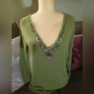 RAYON/NYLON WOMAN'S BEJEWELED V-NECK SWEATER in excellent condition.